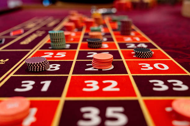 situs kastoto live-dealer studio with multiple camera angles and gaming tables